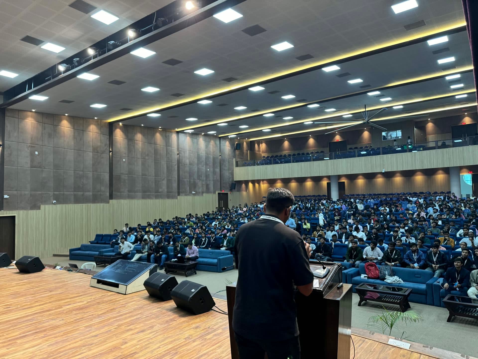 Podium perspective of the packed auditorium at DevFest Bhopal 2024