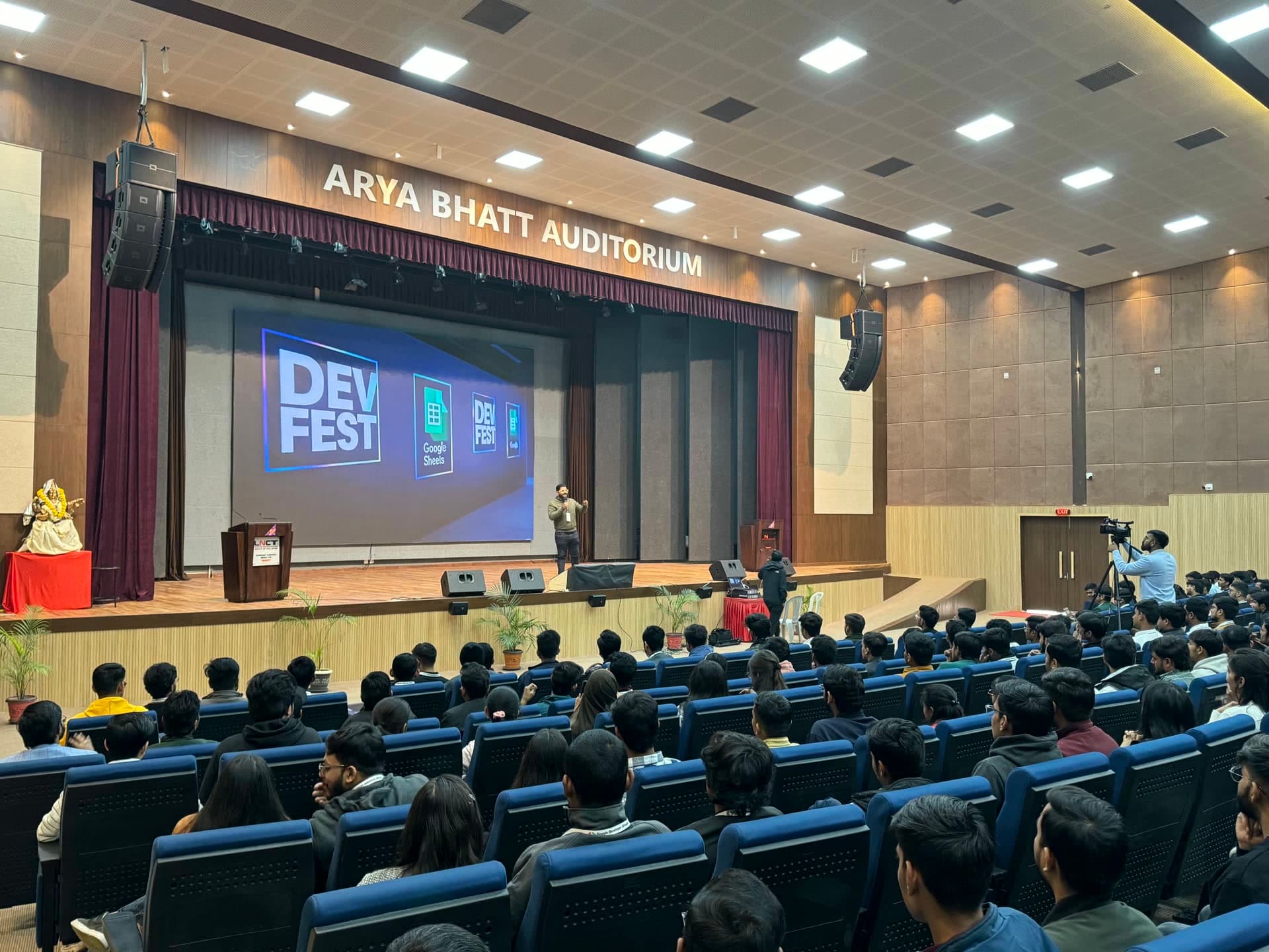 Keynote presentation on stage at Arya Bhatt Auditorium during DevFest Bhopal 2024
