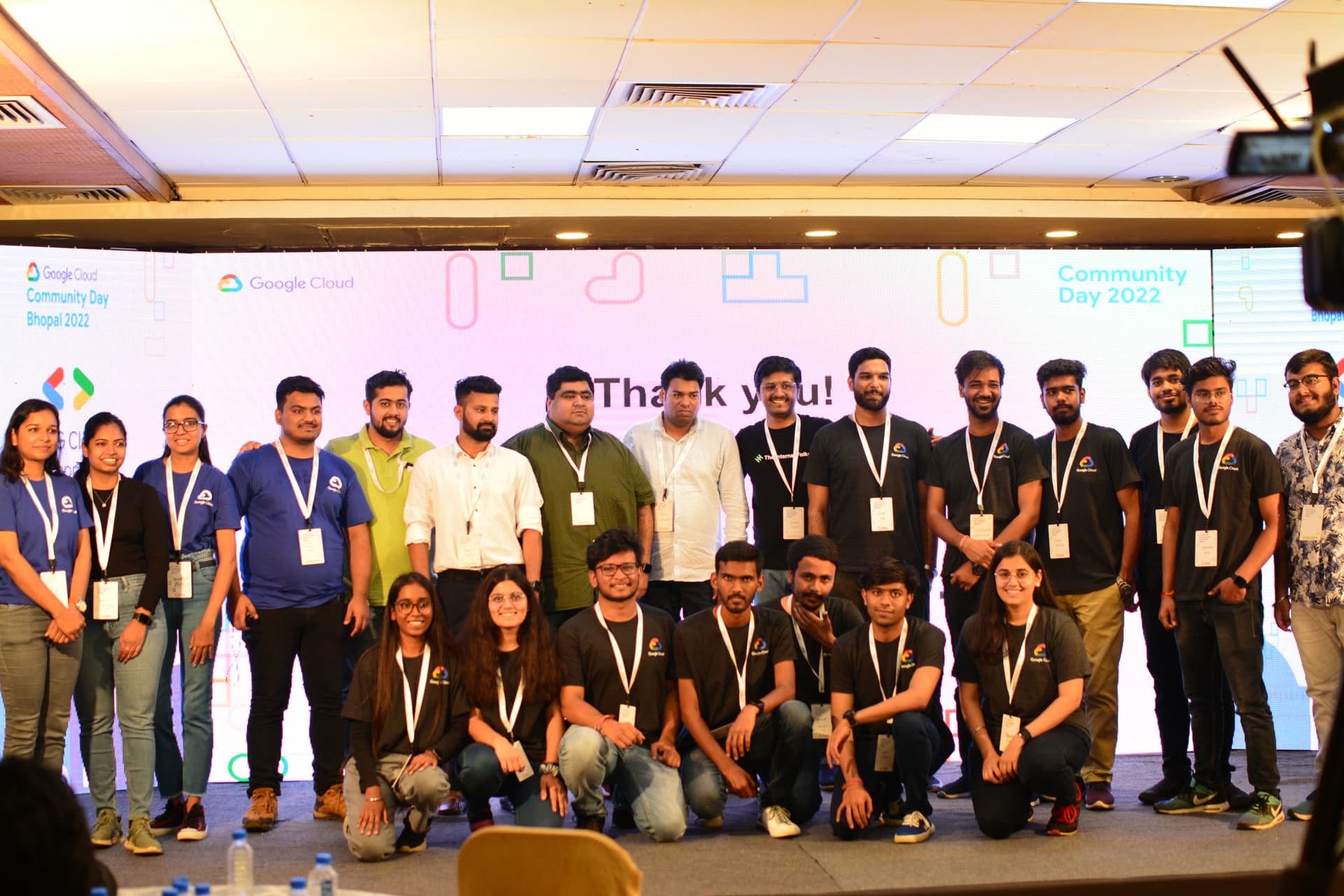 Full crew of volunteers, organizers, and speakers together on stage under the Thank You banner at Cloud Community Day Bhopal 2022