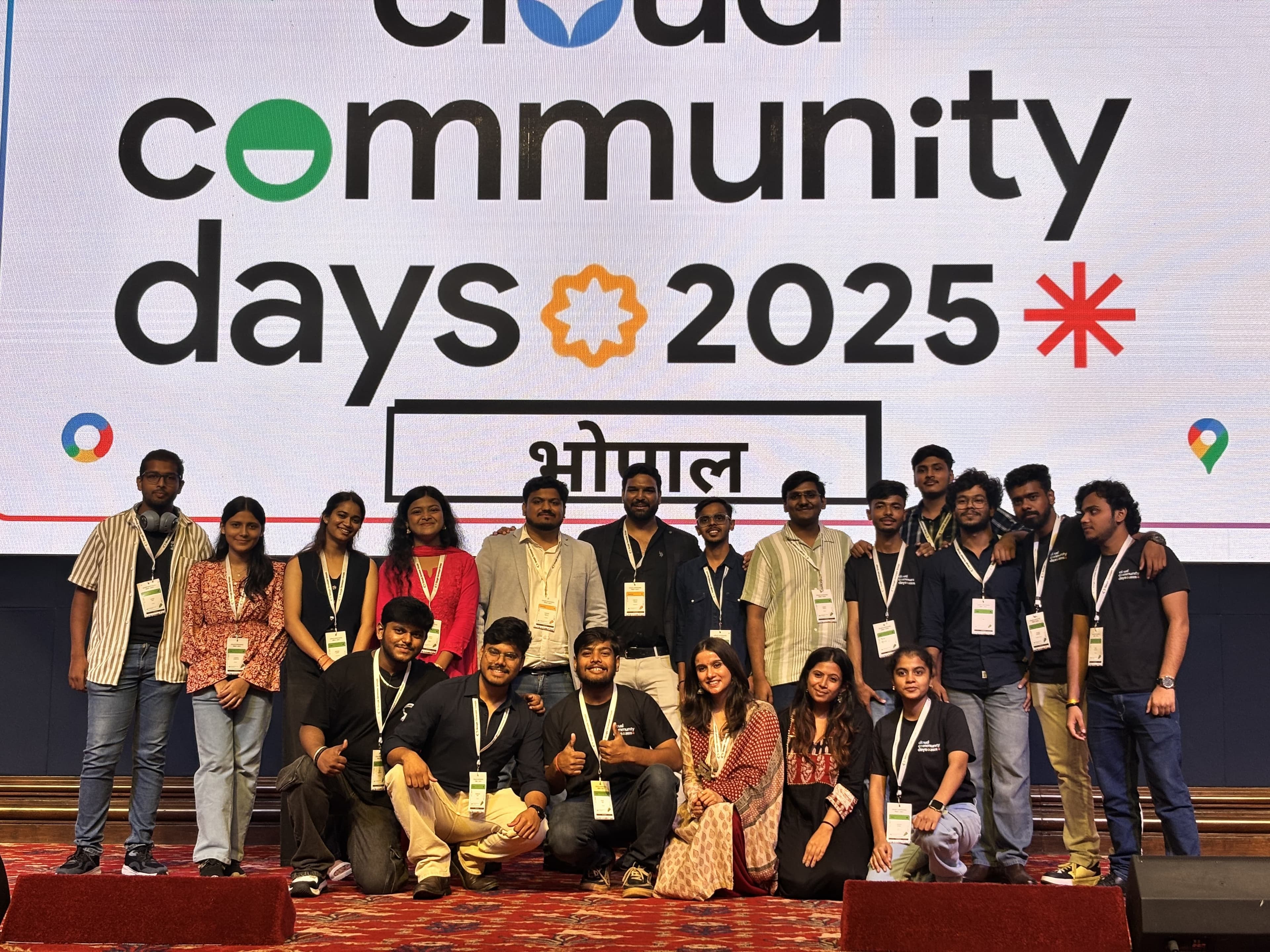Speakers and volunteers on stage at Cloud Community Days Bhopal with the main LED backdrop